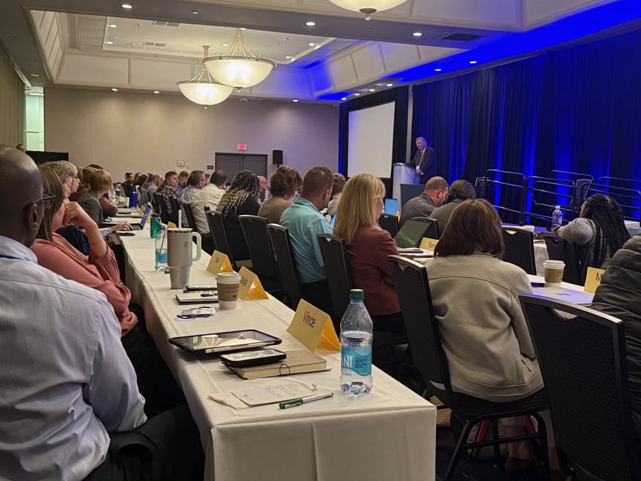 NAADAC Annual Conference — attendees at tables, full room view